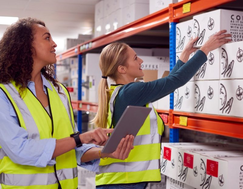 Two women doing inventory using inventory management solutions to improve stock control