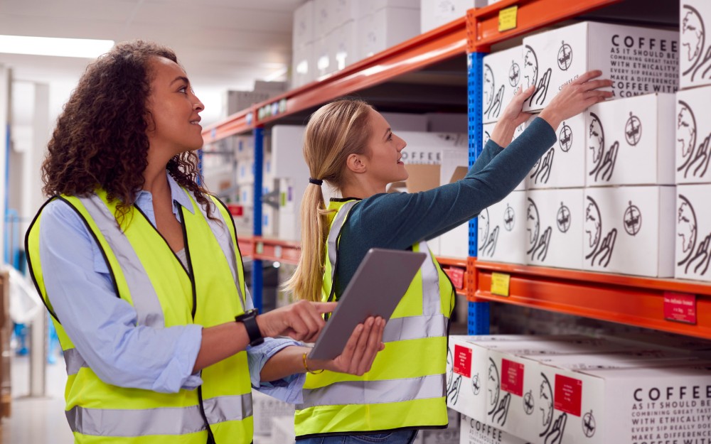 Two women doing inventory using inventory management solutions to improve stock control