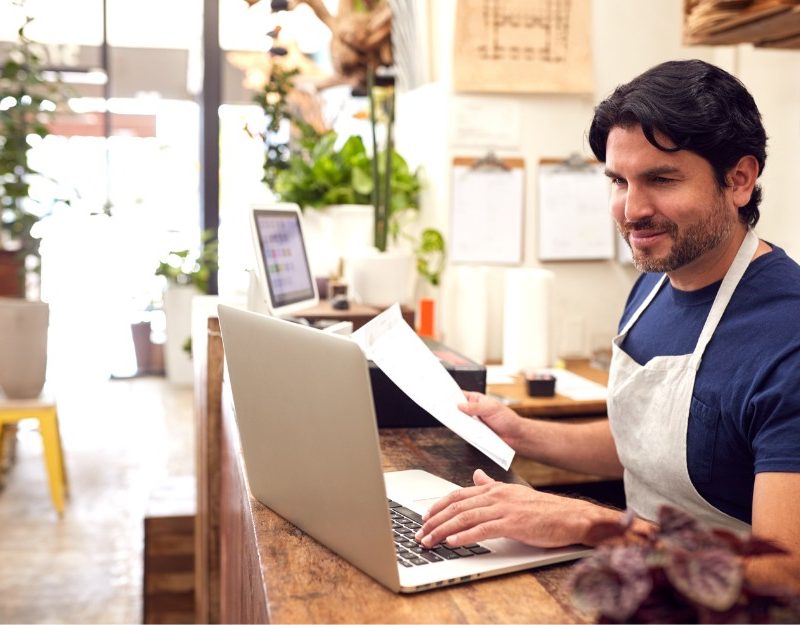 Male business owner using Xero to streamline payroll processing