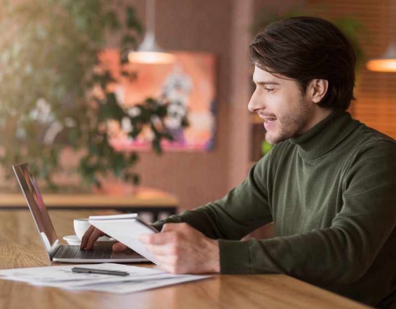 Man working on a computer, thinking, "Grow Your Wealth: Simple Tricks for Fast Financial Growth"