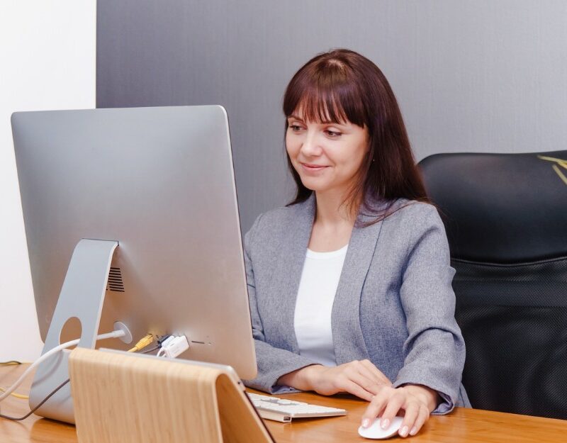 Woman checking her MyID, knows how to protect herself from MyID scams