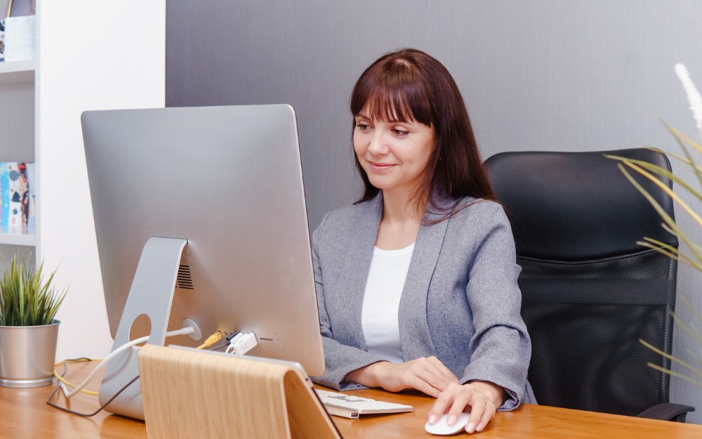 Woman checking her MyID, knows how to protect herself from MyID scams