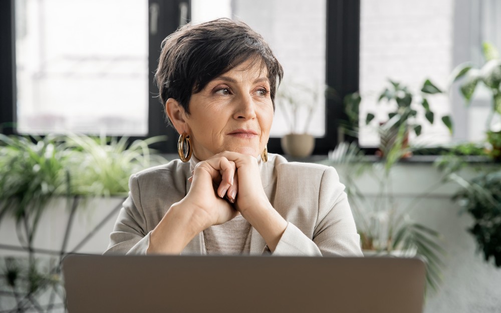 mature businesswoman thinking about SMSF pension