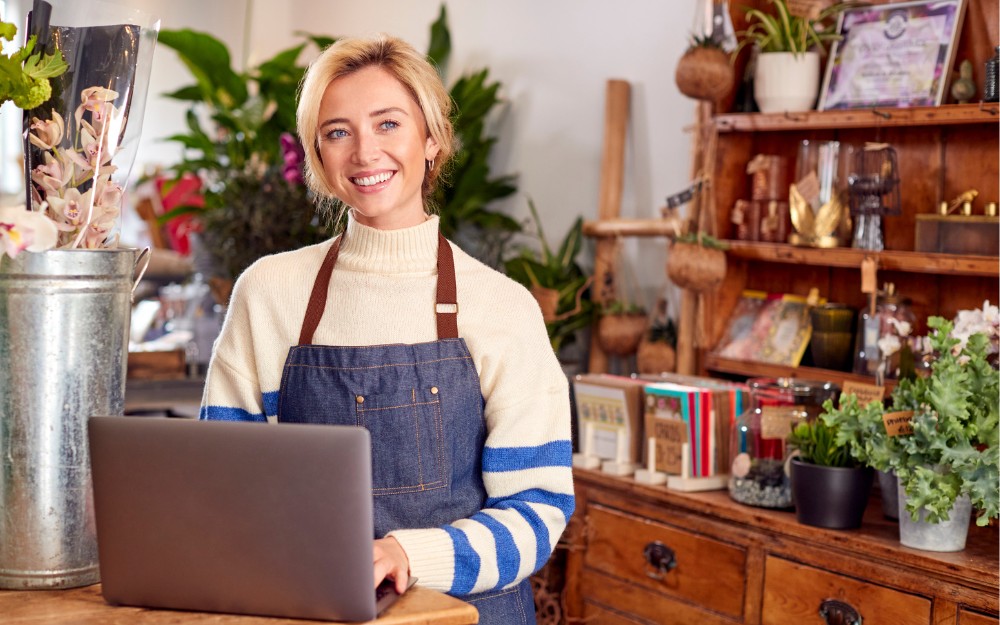 Small business owner doing a breakeven analysis on her computer