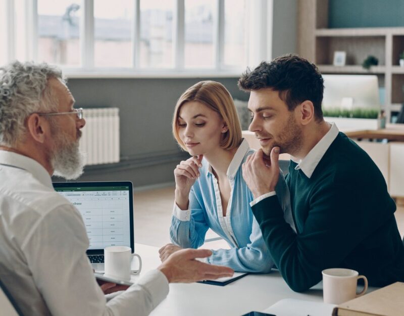 Couple talking to an expert about trusts