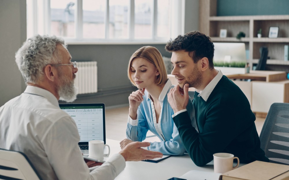 Couple talking to an expert about trusts