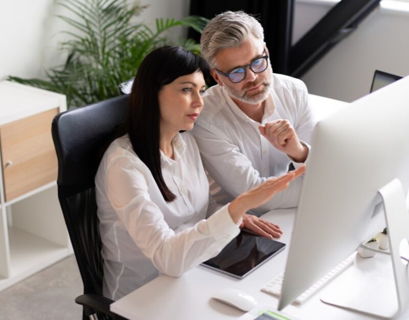 Two owners talking about cybersecurity for small business