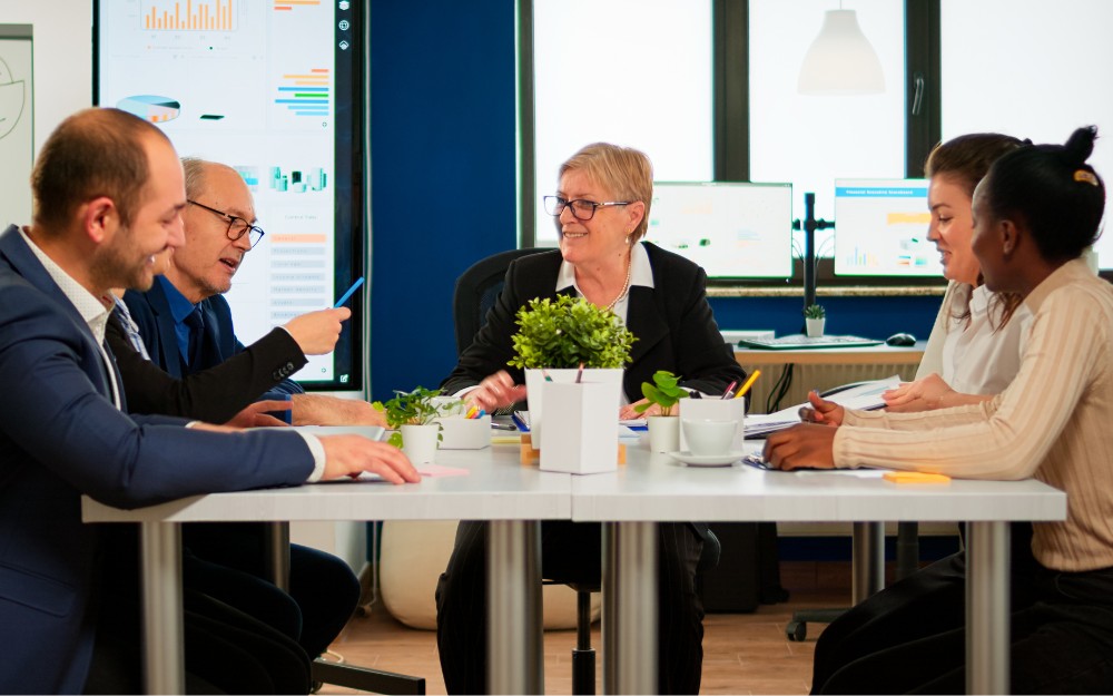 Businesspeople meeting to determine R & D incentive Australia